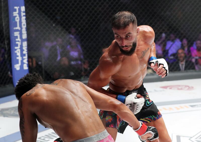 Ali Taleb knocks out Vincius de Oliveira in the bantamweight title fight at UAE Warriors 30.
