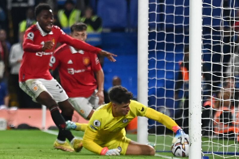 Chelsea's goalkeeper Kepa Arrizabalaga  fails to stop the ball from crossing the line from a header by Manchester United's Casemiro. AFP