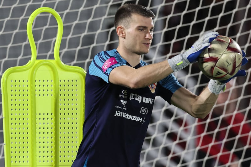 Croatia's goalkeeper Dominik Livakovic trains in Doha. AFP