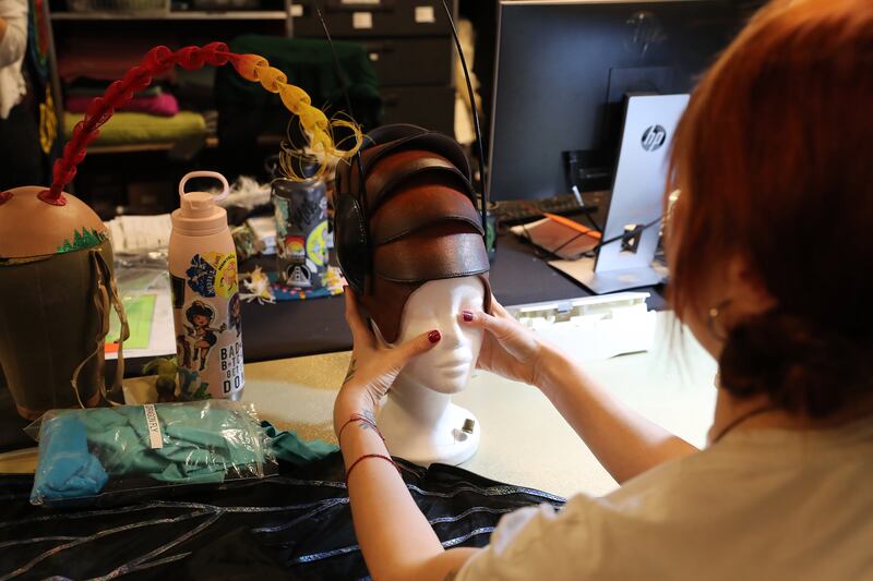 Technicians create the character's insect headpieces