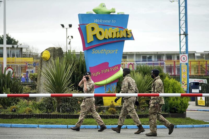 SOUTHPORT, ENGLAND - NOVEMBER 05:  Members of the military arrive at Pontins by Ainsdale Beach to set up a mass Covid-19 testing facility on November 5, 2020 in Southport, England. The UK government are piloting loop mediated isothermal amplification (LAMP) testing technology, offering all Liverpool residents quick-result tests to identify who has coronavirus and asking them to isolate. If this LAMP technology is successful it could lead to an end to lockdowns as a method to combat the COVID-19 Pandemic. (Photo by Christopher Furlong/Getty Images)
