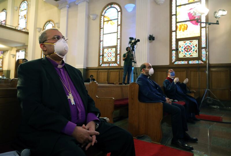 Bishop Andrea Zaki leads a Holy Mass as part of Easter celebrations at the Evangelical Church in Cairo, Egypt, 18 April 2020. EPA