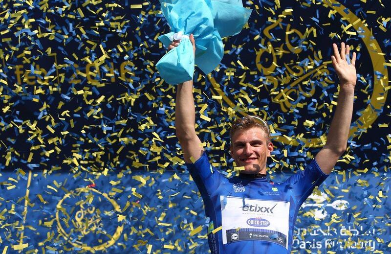 German cyclist Marcel Kittel of Etixx-Quick-Step salutes from the podium after winning the first stage of the Dubai Tour on Wednesday. Marwan Naamani / AFP / February 3, 2016