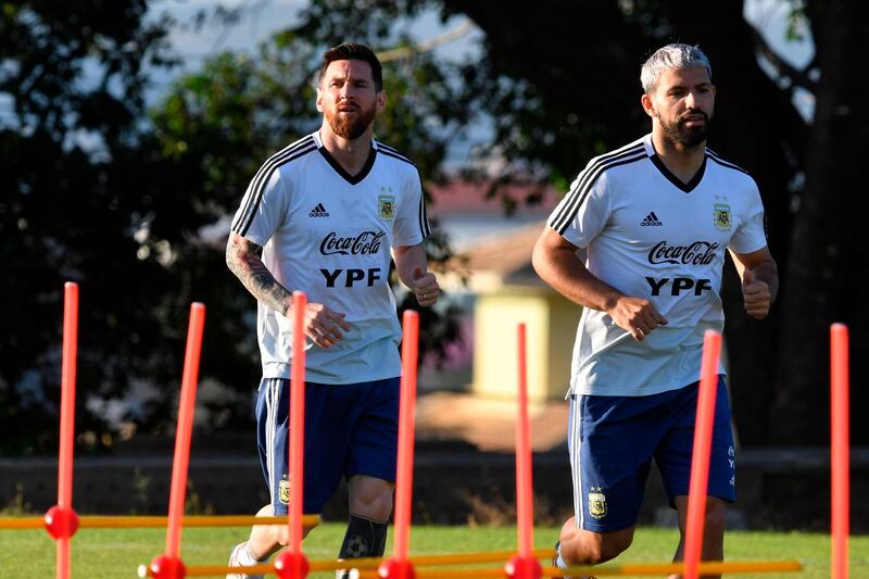 Lionel Messi, left, trains alongside Sergio Aguero. AFP