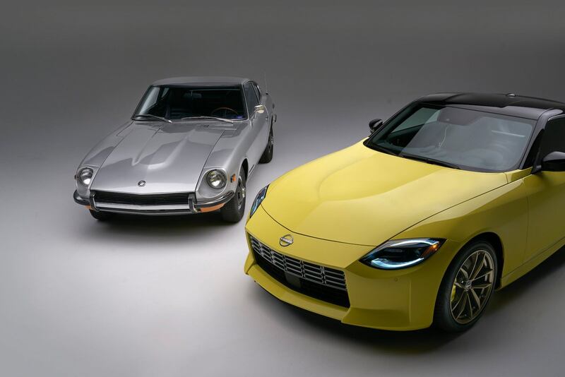 The new 2023 Z in yellow sits alongside its 280Z ancestor.