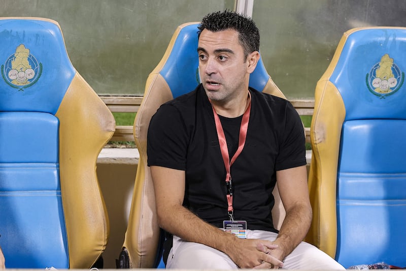 Al-Sadd coach Xavi watches his team in action on November 3 at Thani Bin Jassim Stadium in Qatar's capital Doha. AFP