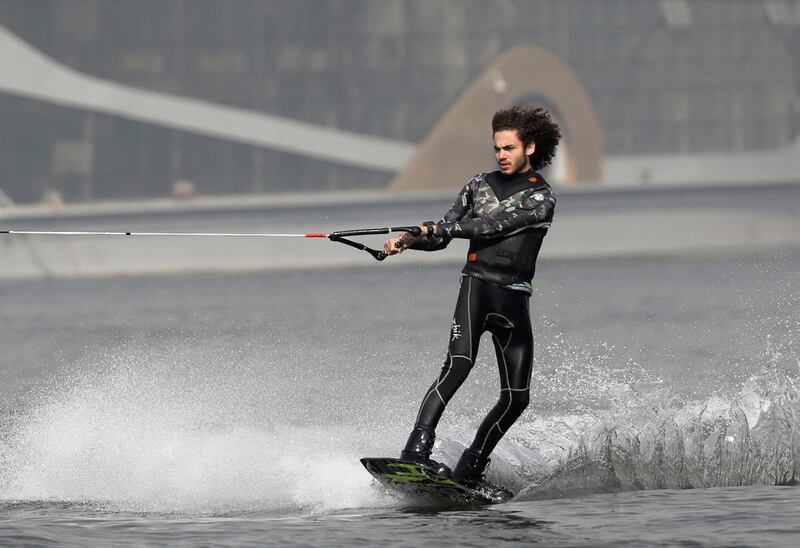 An Egyptian waterskier practises on the River Nile in front of the Egyptian Sailing and Water Ski Federation in Cairo, Egypt. Reuters
