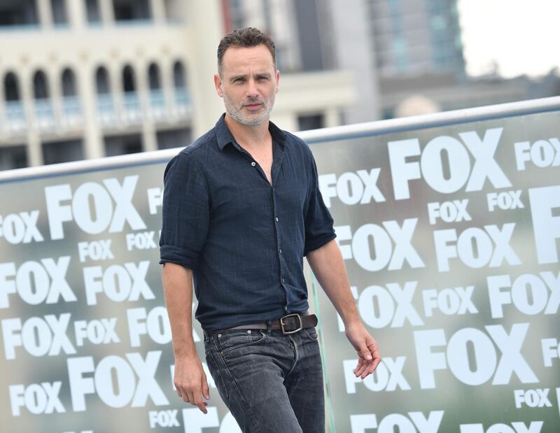 (FILES) In this file photo taken on July 20, 2018 shows British actor Andrew Lincoln arrives for "The Walking Dead" photo call at Comic-Con International 2018 in San Diego, California. The world's largest fan convention bid a poignant farewell to the star of the most successful show in cable TV history on Friday as zombies took over San Diego Comic-Con. The departure of British actor Andrew Lincoln, who has appeared as Sheriff Rick Grimes in almost every episode since the 2010 pilot, has been an open secret since May, confirmed inadvertently by executive producer Robert Kirkman. / AFP / CHRIS DELMAS
