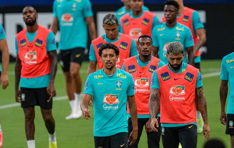 Brazil's Marquinhos, centre, and teammates. AP Photo