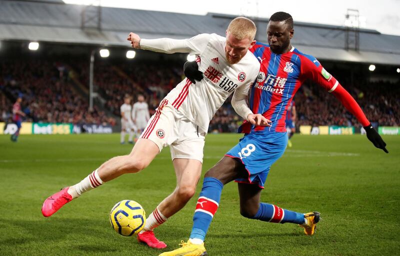 Cheikhou Kouyate - £65,000 a week down. Reuters