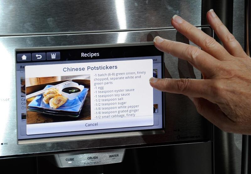 Companies like Samsung and LG have already launched smart fridges, washing machines and vacuum cleaners that relay information back to the user’s mobile phone. Ethan Miller / Getty Images