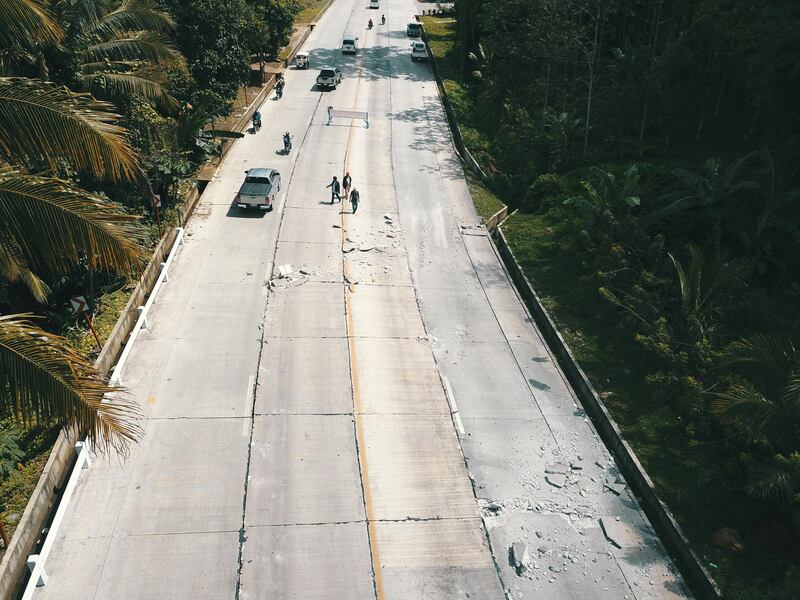 epa07961840 An aerial shot taken with a drone shows a damaged road in the aftermath of a 6.5 magnitude earthquake, in Kidapawan city, Cotabato province, Philippines, 31 October 2019. According to the United States Geological Survey (USGS), a 6.5 magnitude earthquake occurred at a depth of 10km near Bulatukan, Cotabato province, on 31 October. It is the third strong earthquake the area has experienced this month.  EPA/CERILO EBRANO