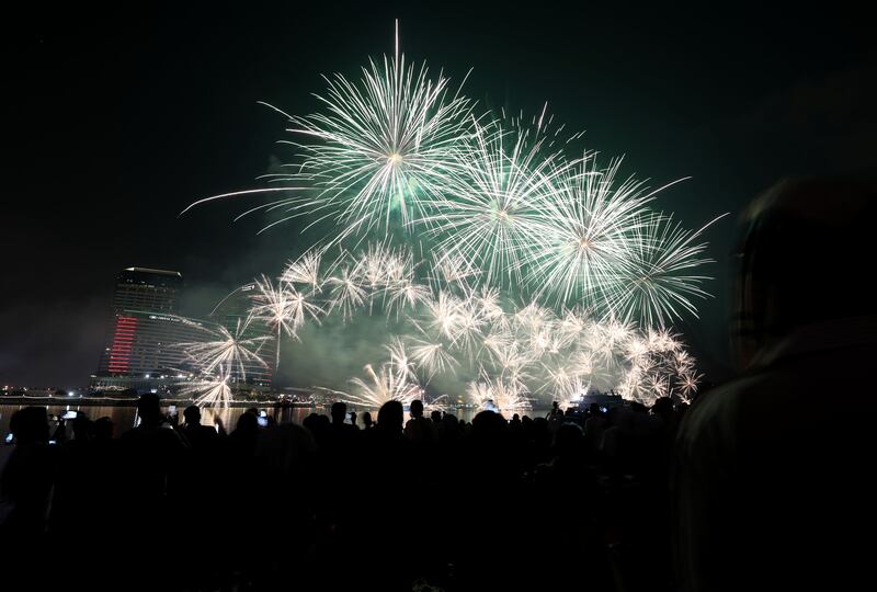 Fireworks go off for the UAE's 51st National Day at Festival Bay, Dubai. Chris Whiteoak / The National