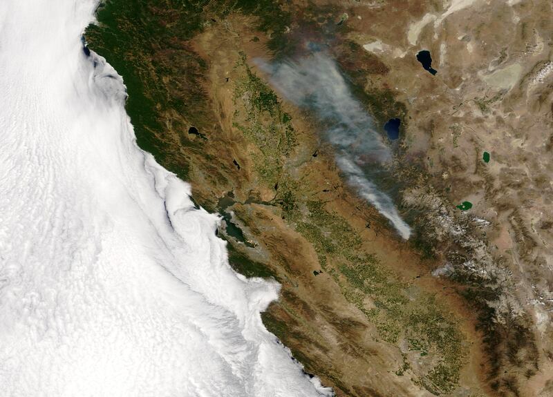 A Nasa image shows smoke from wildfires raging near Yosemite National Park in California on July 24. EPA