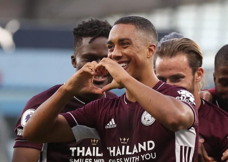 Youri Tielemans celebrates scoring Leicester's fifth goal with teammates after converting from the spot. Reuters