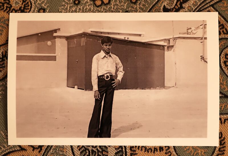 Shaukat as a teenager near his family home in Dubai.