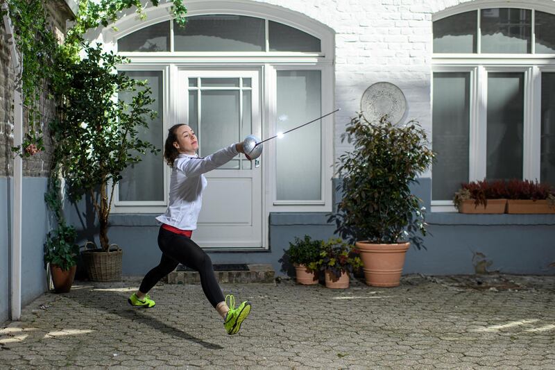 COLOGNE, GERMANY - APRIL 06: German sabre fencer Anna Limbach trains in her backyard on April 06, 2020 in Cologne, Germany. Anna Limbach normally trains with a partner, but due to the lockdown she, like many professional athletes, is having to improvising training sessions to stay fit. The Coronavirus (COVID-19) pandemic has spread to many countries across the world, claiming over 70,000 lives and infecting over 1 million people. (Photo by JÃ¶rg SchÃ¼ler/Getty Images)