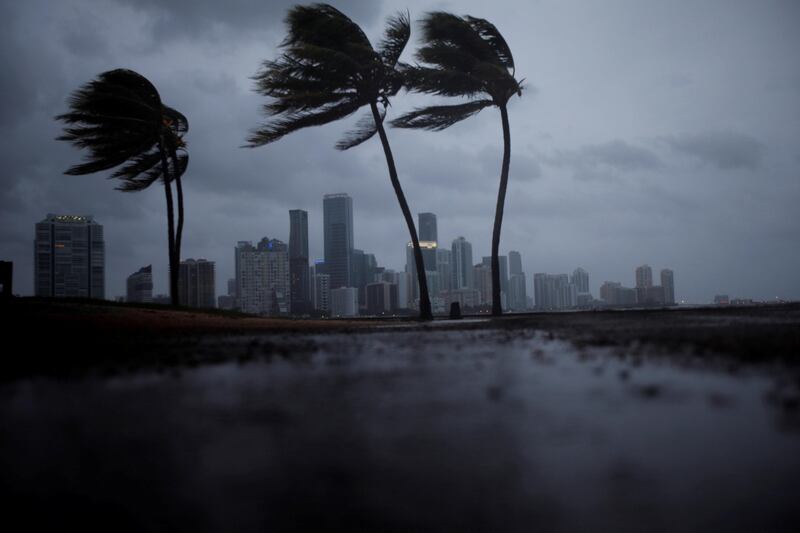 Dark clouds are seen over Miami's skyline before the arrival of Hurricane Irma to south Florida, U.S. September 9, 2017. REUTERS/Carlos Barria TPX IMAGES OF THE DAY