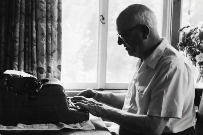 British-born novelist P G Wodehouse working at his home in Remsenberg, Long Island, New York.