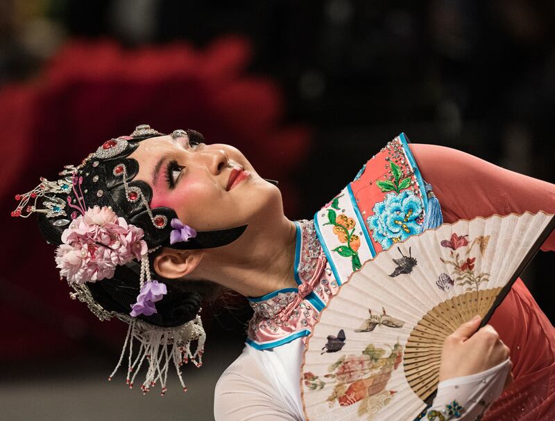 Sydney Peng, 19, performs a Chinese opera dance in the Mall of America in Bloomington, Minnesota. AP