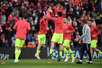 LIVERPOOL, ENGLAND - MAY 07:  Lionel Messi and Luis Suarez of Barcelona warm up prior to the UEFA Champions League Semi Final second leg match between Liverpool and Barcelona at Anfield on May 07, 2019 in Liverpool, England. (Photo by Shaun Botterill/Getty Images)