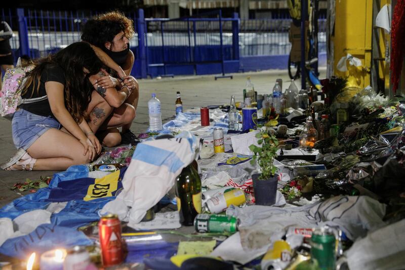 People mourn outside the Alberto J. Armando "La Bombonera" stadium in Buenos Aires. Reuters