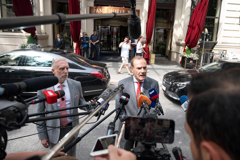 Enrique Mora speaks to the press outside the Grand Hotel Wien where talks were held. AFP