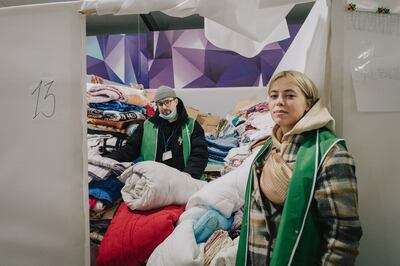 Artyom and Polina fled Odessa the morning Russian troops invaded Ukraine. Now they volunteer at the MoldExpo center helping other refugees. Erin Clare Brown