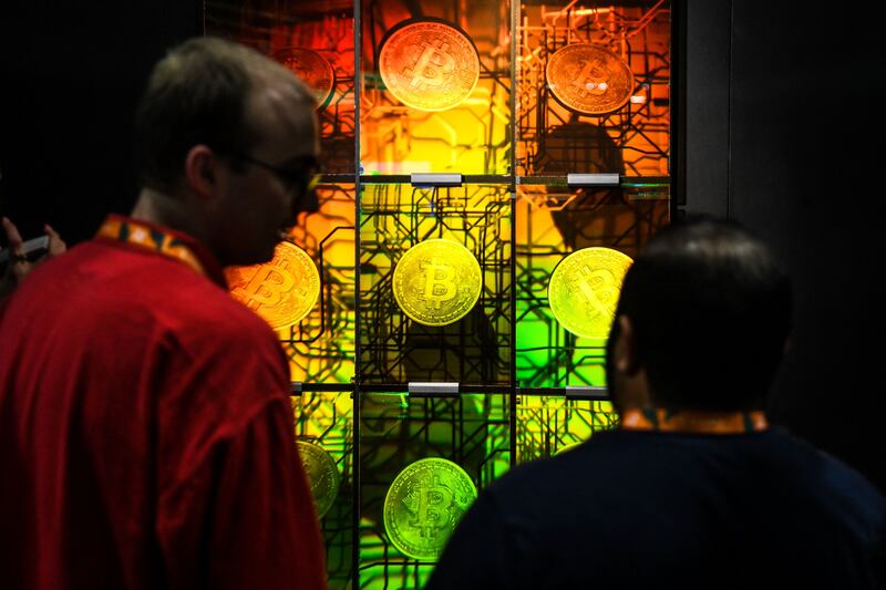 A Bitcoin-themed art installation in Miami. The digital coin fell at the weekend after the Fed chief said interest rate increases would continue. AFP
