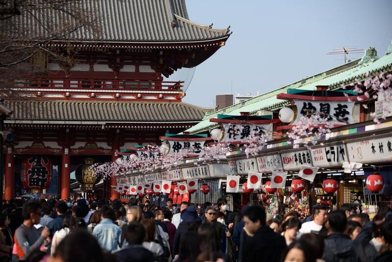 Visitors and tourists in the Asakusa district of Tokyo, Japan in March. The country anticipates a surge in tourism ahead of Tokyo hosting the Olympics in 2020. Akio Kon / Bloomberg