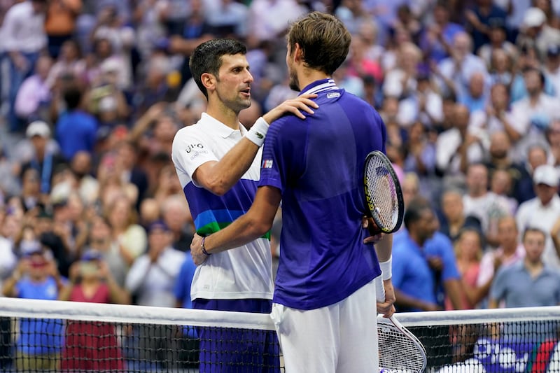 Novak Djokovic, of Serbia, left, congratulates Daniil Medvedev, of Russia. AP Photo