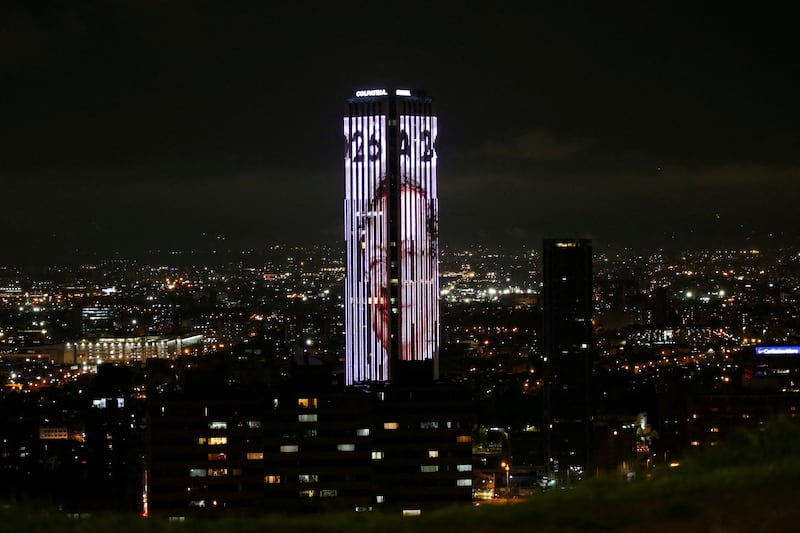 The Colpatria tower in Bogota is illuminated with a picture of Mr Petro of the Historic Pact coalition. Reuters