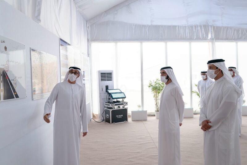 Sheikh Mohammed bin Rashid, together with Sheikh Mansour bin Zayed, view displays of the new developments.