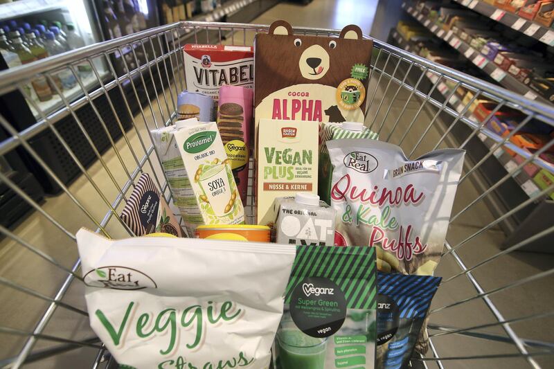 BERLIN, GERMANY - FEBRUARY 02:  A grocery cart filled by the photographer with vegan food products stands in a Veganz vegan grocery store on February 2, 2018 in Berlin, Germany. Veganz has three stores in Berlin and sells a wide range of vegan foods. Vegan food offerings are a growing trend in Berlin with more and more restaurants and shops specializing in purely plant-based products as an alternative to conventional meat or dairy-based foods.  (Photo by Sean Gallup/Getty Images)