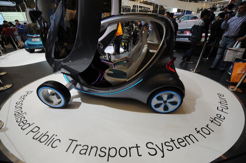 An electric concept car by Chinese auto maker Chery is seen on the opening day of the Shanghai auto show on April 21, 2013. Chinese buyers swarmed around hundreds of vehicles at the Shanghai auto show at its opening highlighting the importance of the world's largest car market to manufacturers. AFP PHOTO/Peter PARKS
 *** Local Caption ***  958100-01-08.jpg