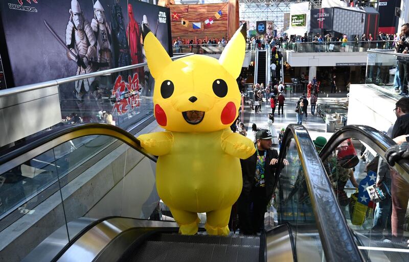 A cosplayer as Pikachu from the Pokemon franchise. AFP