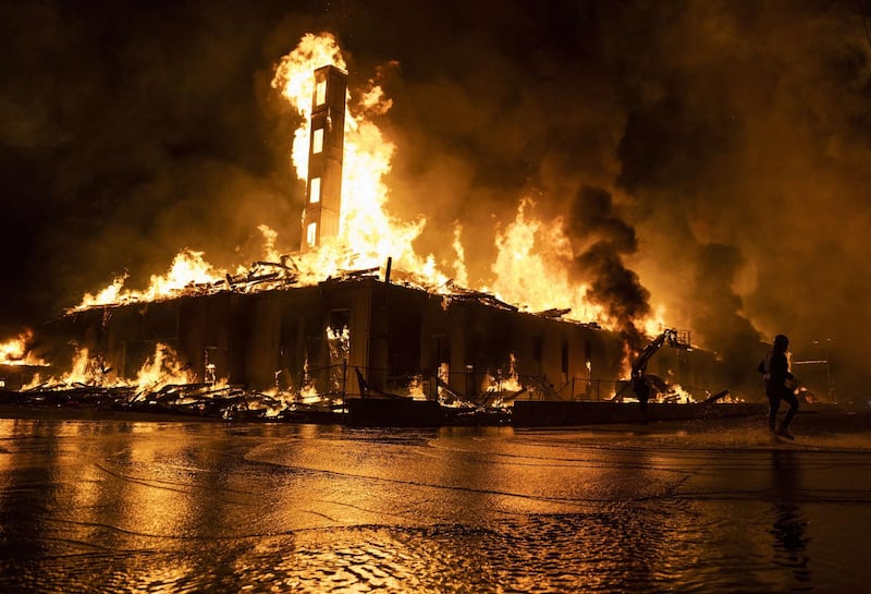 A number of businesses and homes were damaged as the area has become the site of an ongoing protest after the police killing of George Floyd. Getty Images via AFP