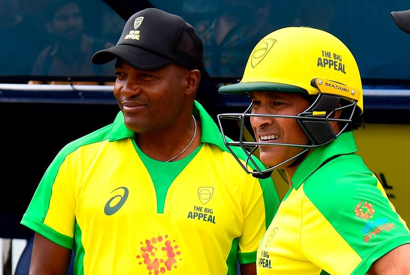 Former West Indies star batsman Brian Lara, left, and India's Sachin Tendulkar during the Bushfire Cricket Bash T20 match at Junction Oval in Melbourne on Sunday. The campaign raised Aus$7.7 million (Dh18m) for bushfire relief. AFP