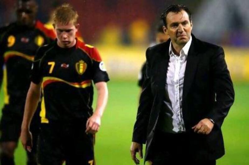 Marc Wilmots, right, and his Belgium team currently sit top of qualifying Group A as they prepare to take on Scotland tomorrow night. Marko Djurica / Reuters