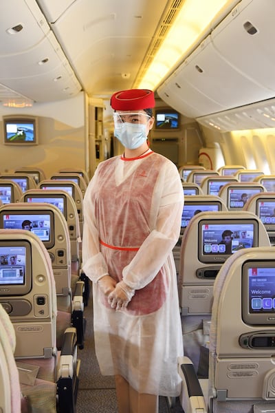 Expect all Emirates crew to be wearing PPE on flights, passengers must wear face masks for the duration of flights. Courtesy Emirates 
