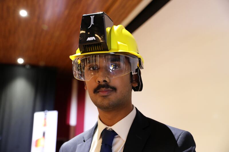 Kausthub Kaundinya, chief executive of Jarsh Safety, at the unveiling of an air-conditioned safety helmet at the Indian pavilion at Expo 2020 Dubai on Wednesday. All photos: Pawan Singh / The National