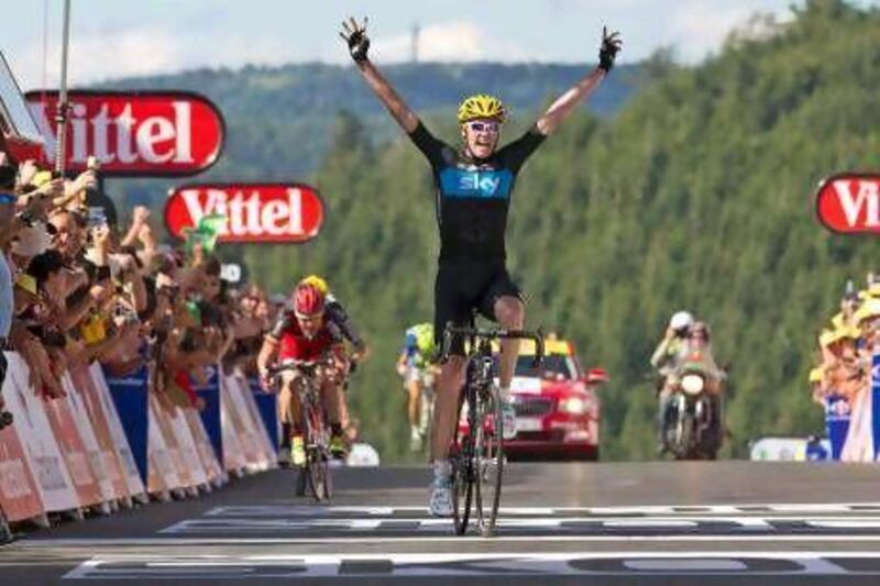Christopher Froome took the Stage 7 win, finishing ahead of Cadel Evans of Australia, left, but Bradley Wiggin's third-place finish was enough to give him the yellow jersey of the overall leader.