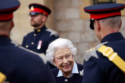 Queen Elizabeth meets members of the Royal Regiment of Canadian Artillery in Windsor, Britain, in October. Reuters