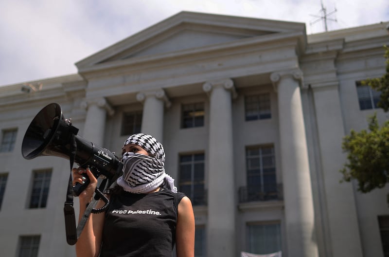 A pro-Palestinian protester in front of Sproul Hall in Berkeley, California. Getty Images / AP 