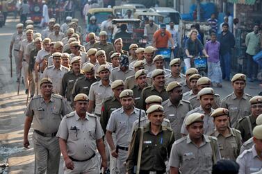 Police officers stage a show of force in New Delhi before the Supreme Court's verdict on a disputed religious site claimed by Hindus and Muslims on November 9, 2019. Reuters