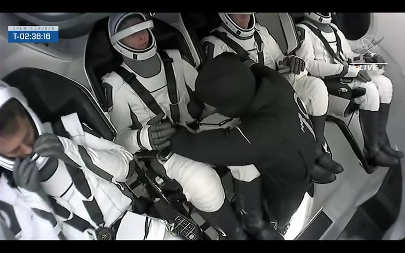 Ground teams prepare the astronauts for launch. Photo: Nasa