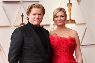 US actor Jesse Plemons, left, and US actress Kirsten Dunst attend the 94th Oscars at the Dolby Theatre in Hollywood, California on March 27, 2022. AFP