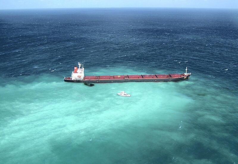AUSTRALIA - APRIL 4:  Fuel oil leaks from the Shen Neng 1, a Chinese-registered bulk coal carrier grounded in the Great Barrier Reef Marine Park on April 4, 2010, off the coast of central Queensland, Australia. The ship appeared to have veered off its path into a restricted section of the marina park when it ran aground on a shoal on April 3 with approximately 975 tonnes of fuel oil onboard. (Photo by Maritime Safety Queensland via Getty Images)