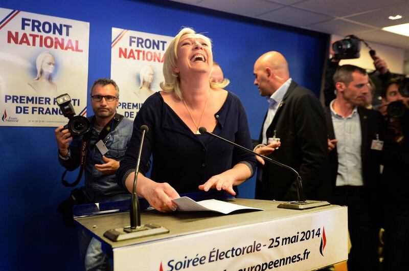 French far-right National Front party president Marine Le Pen at the party's headquarters in Nanterre, outside Paris after her party topped the polls in European elections with an unprecedented haul of one in every four votes cast,. AFP PHOTO / PIERRE ANDRIEU

