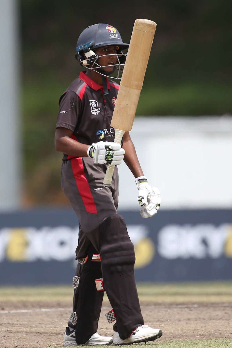 Theertha Satish raises her bat after bringing up her half century in 36 balls in the final against Malaysia. Photo: Malaysia Cricket Association